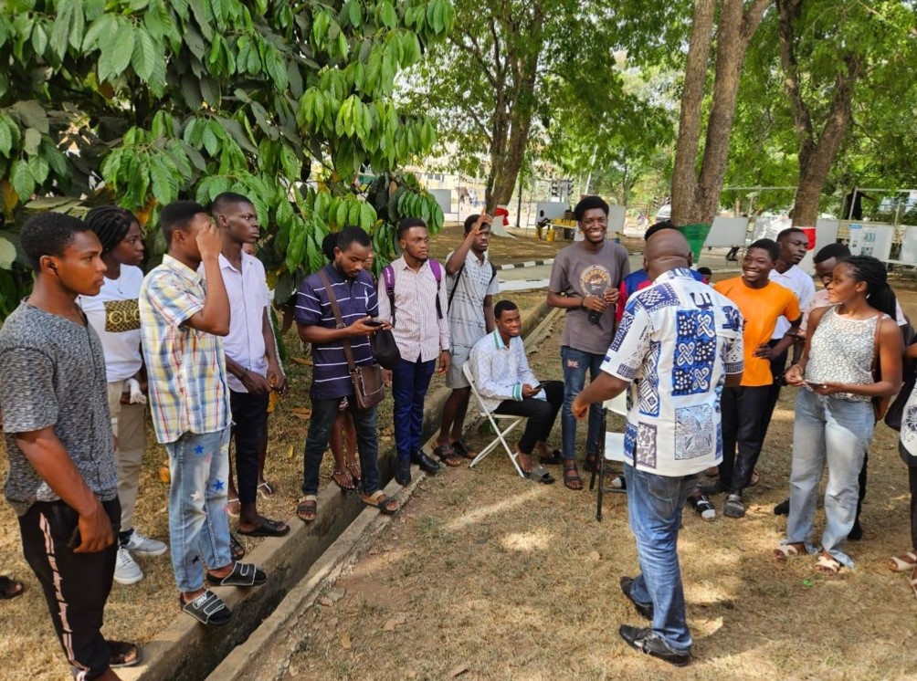 Students at KNUST gathered outdoors during the AgriConnect roadshow